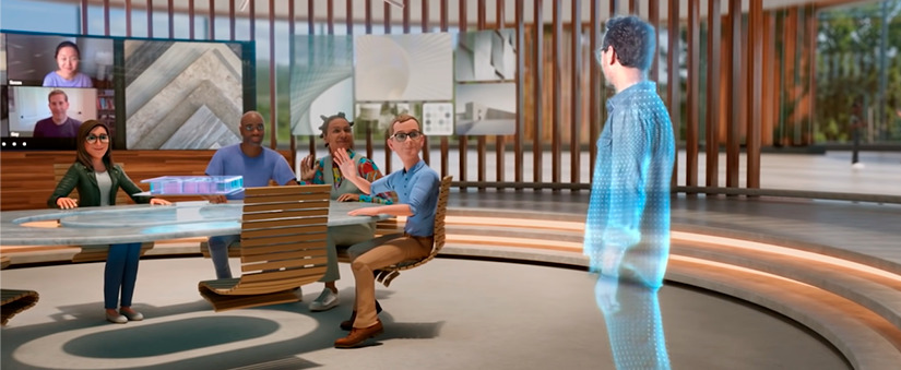 Metaverso: Pessoa em holograma conversando com colegas de trabalho em mundo virtual