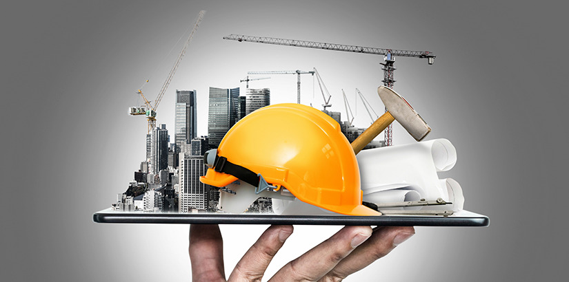 tecnologia na construção civil: imagem de uma mão segurando um dispositivo móvel e, em cima, miniaturas de prédeios e elementos da construção civil