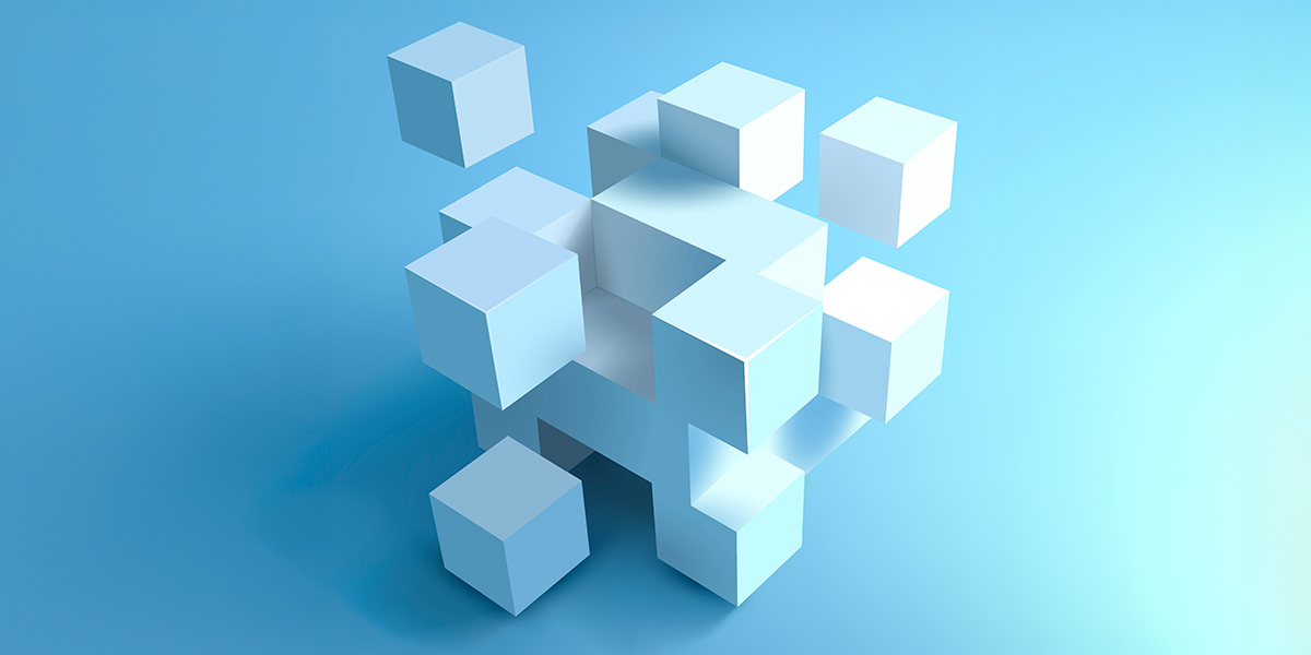 construção modular: imagem de cubos brancos empilhados formando uma figura abstrata.