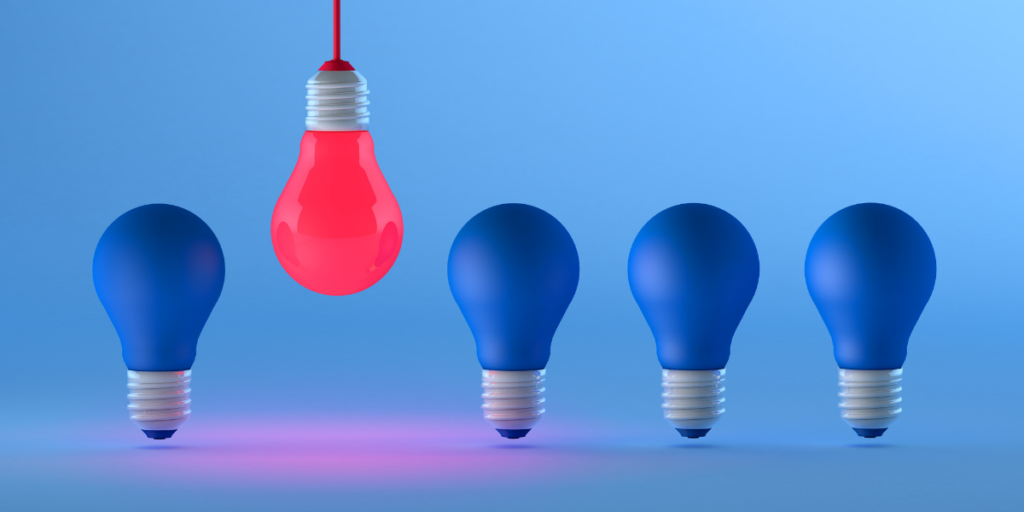 Agente imobiliário ou Corretor de imóveis: ilustração de 4 lâmpadas azuis e uma vermelha, na direção oposta das demais.
