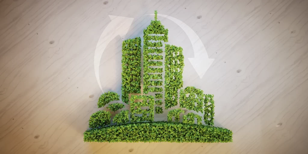 Construção Ecoeficiente: imagem de um edifício feita com folhas e árvores.