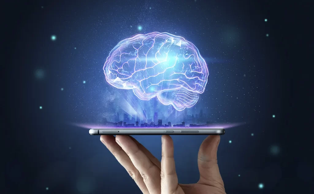 Inteligência artificial no mercado imobiliário: imagem de uma mão segurando um celular. Da tela do celular sai uma ilustração de uma cidade e, acima, um cérebro.