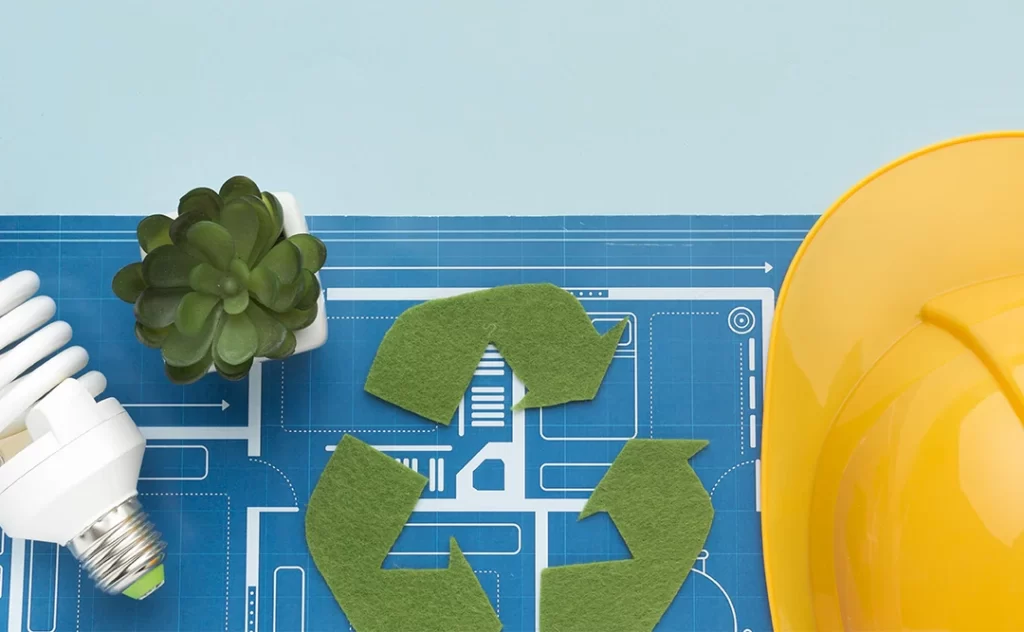 Selos de sustentabilidade na construção civil mundial: imagem a planta de uma casa. Acima dela alguns elementos como uma lâmpada, um capacete, uma planta e o símbolo da reciclagem.