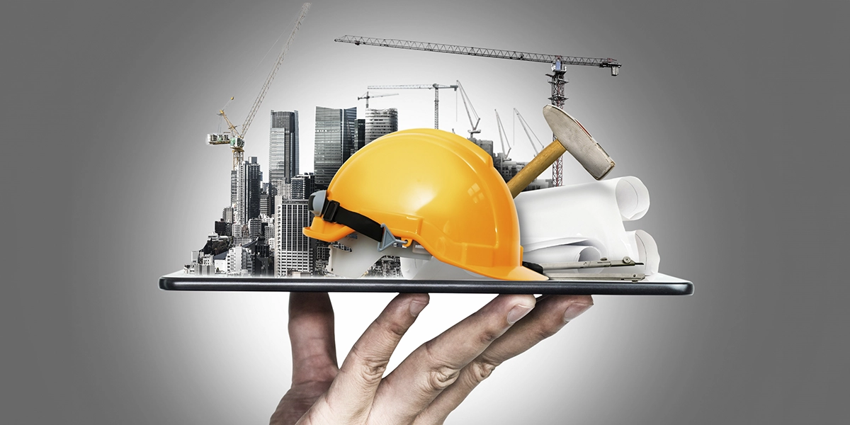Software Imobiliário: imagem de uma mão segurando um tablet. Da tela, saem vários prédios e elementos de construção civil.